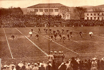 Notre Dame halfback George Gipp carrying the football against Army in 1920