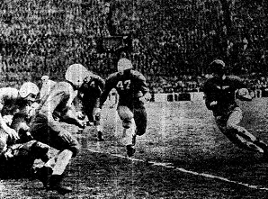 Pittsburgh back John Urban carrying against Nebraska in a 1937 football game