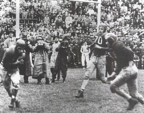 Ohio State halfback Paul Sarringhaus scoring a touchdown on a catch against Michigan in 1942