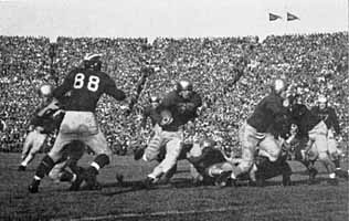 1943 Notre Dame - Michigan football game, Jim Mello carrying the ball for Notre Dame