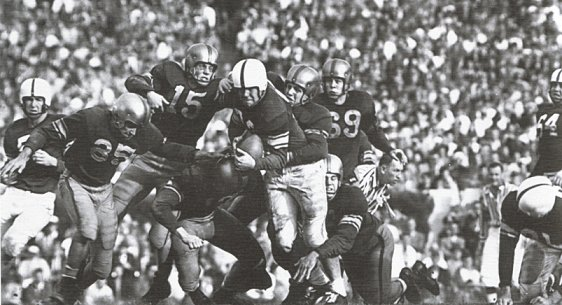 Oklahoma back Lindell Pearson carrying against LSU in the 1950 Sugar Bowl
