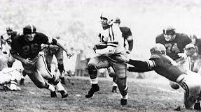 Ohio State halfback Bobby Watkins scoring a touchdown against USC in the 1955 Rose Bowl