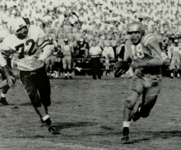 UCLA halfback Primo Villanueva scoring a touchdown against Stanford in 1954