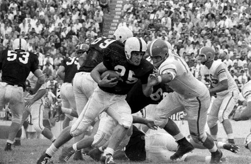 Oklahoma halfback Tommy McDonald carrying the ball