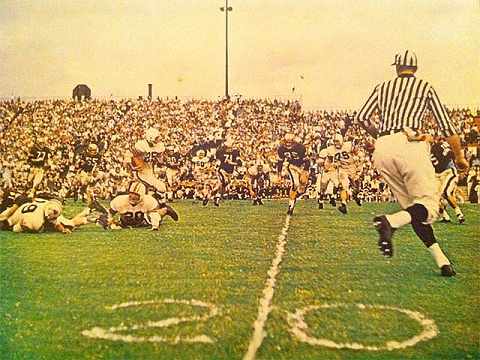 Auburn advancing the ball in a 1957 football game
