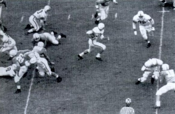 Auburn fullback Billy Atkins carrying the ball against Tennessee in 1957