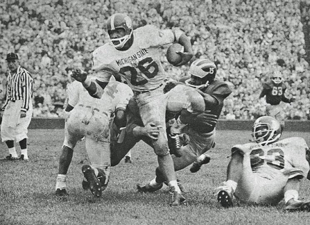 Michigan State running back Clint Jones carrying against Michigan in 1965