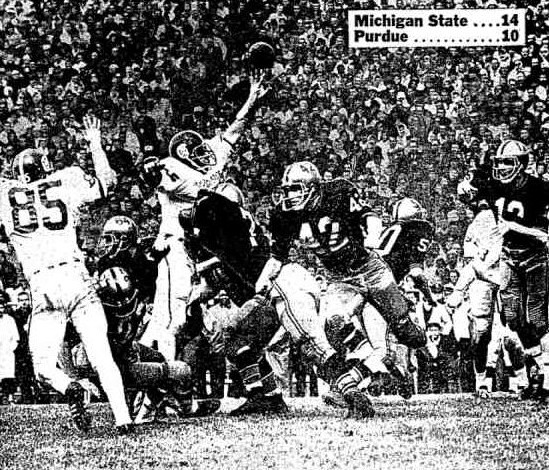 Purdue quarterback Bob Griese completing a pass against Michigan State in 1965