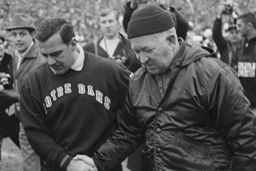 Notre Dame coach Ara Parseghian and Michigan State coach Duffy Daugherty shake hands after their 10-10 tie in 1966