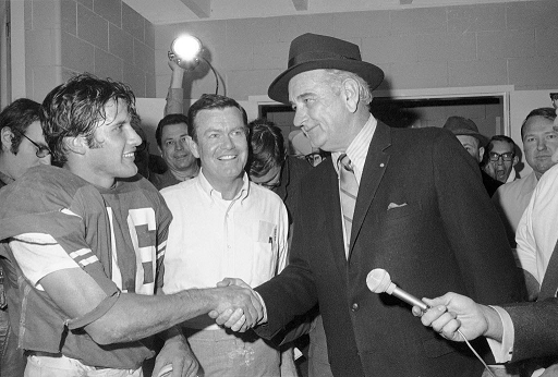 Former president Lyndon Johnson congratulates Texas after their win over Notre Dame in the 1970 Cotton Bowl