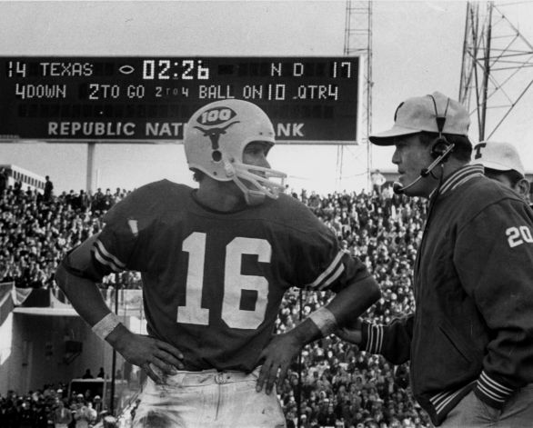 Texas coach Darrell Royal conferring with quarterback James Street before the biggest play in the 1970 Cotton Bowl