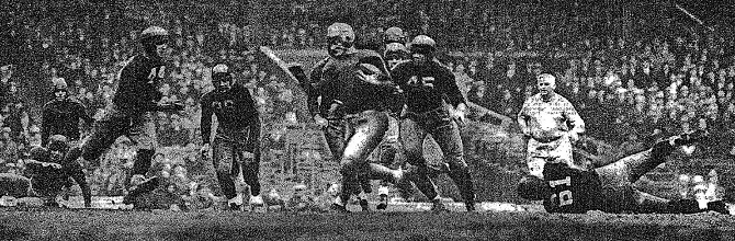 Oregon State carrying against Fordham in 1933